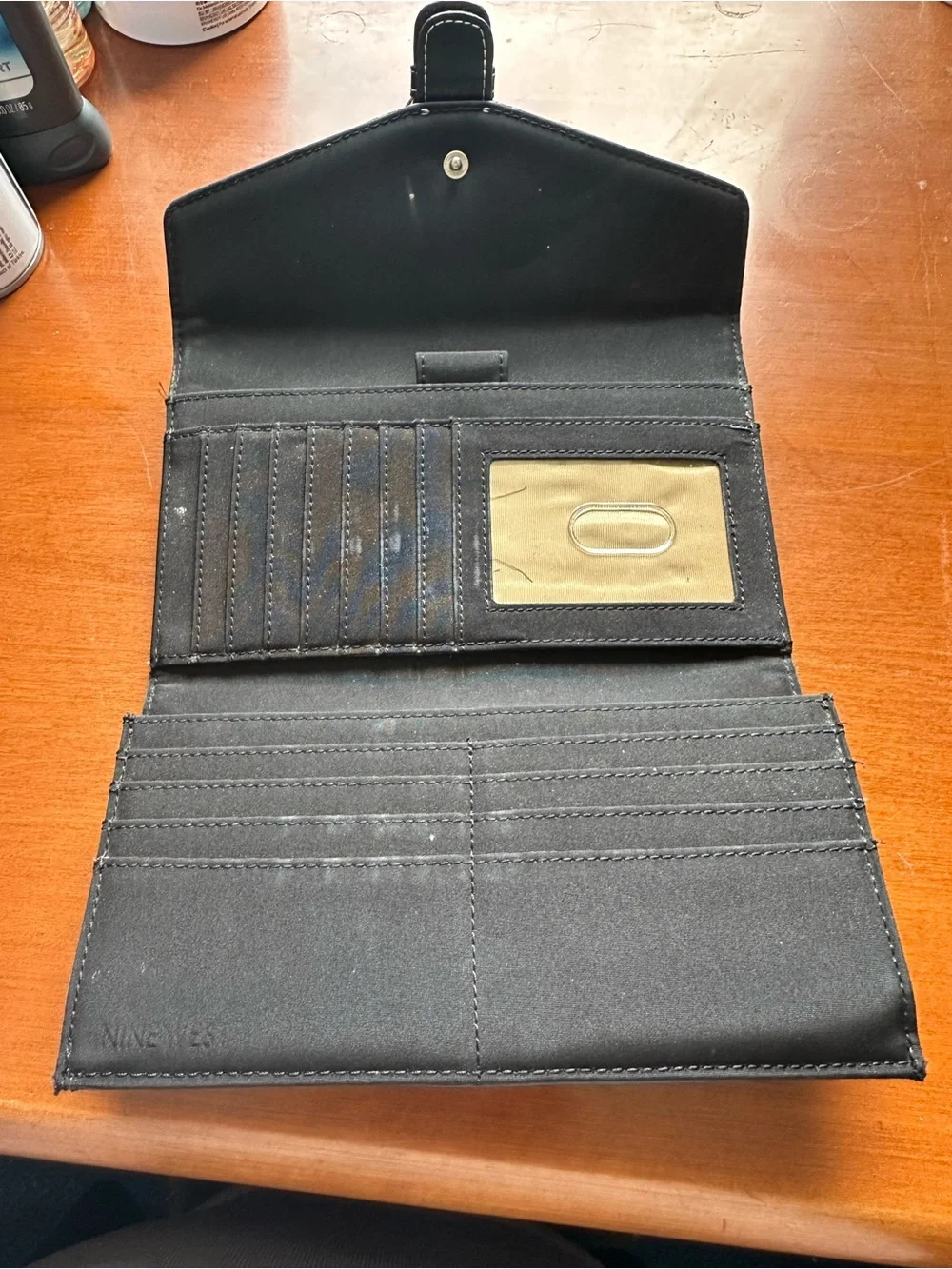 Women’s Black Quilted Buckle Wallet